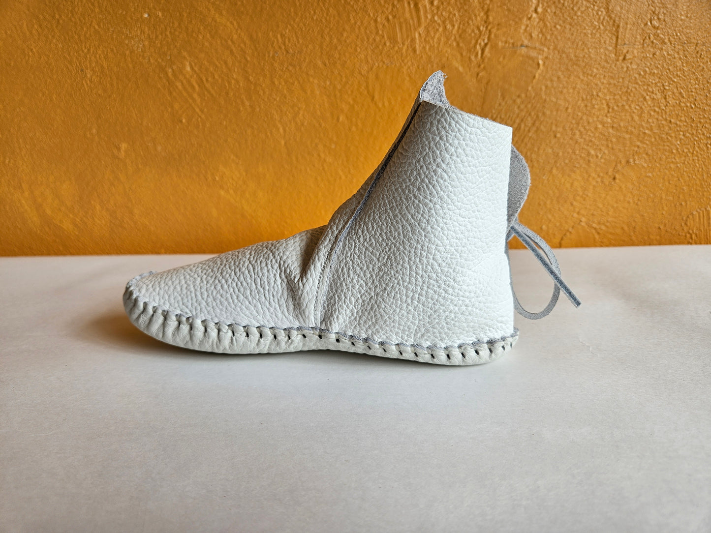 Kids #570 White Taos Moccasins